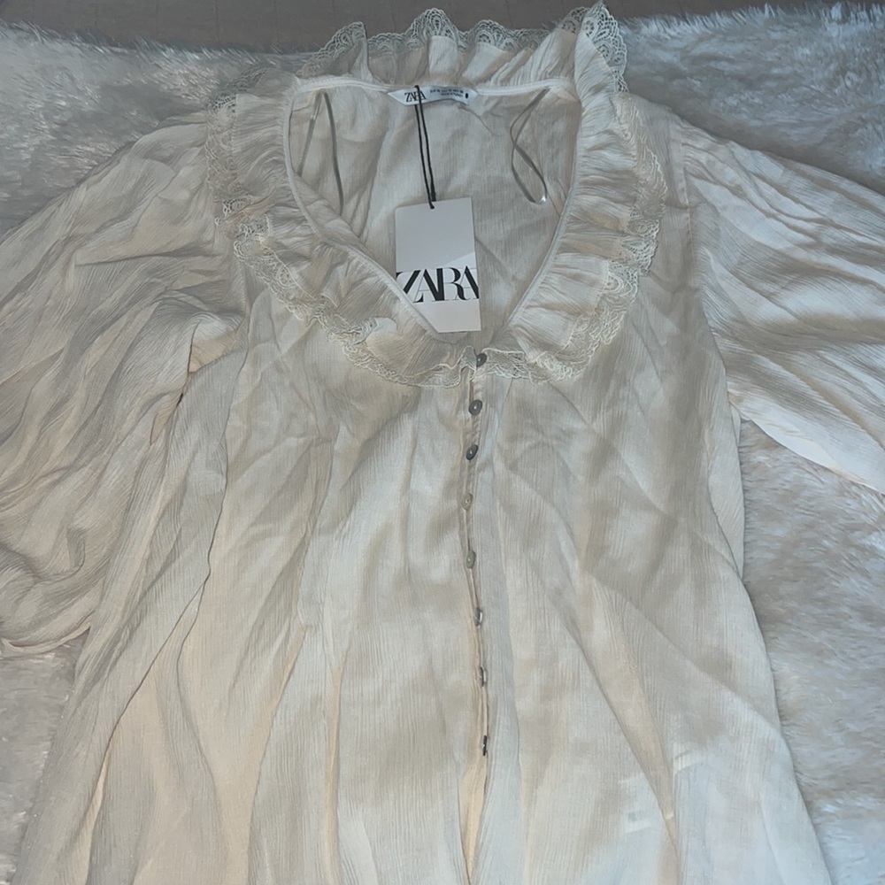 Zara beautiful cream blouse.